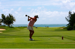 practicing golf